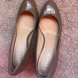 Coach women pumps.